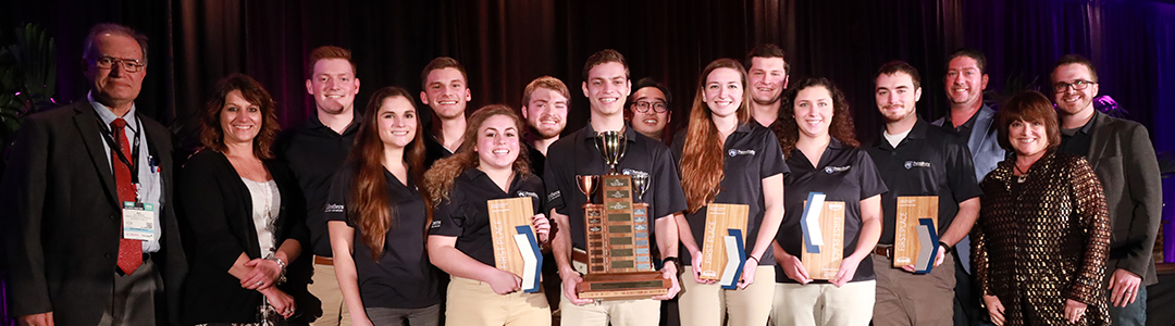 Students with first place trophy