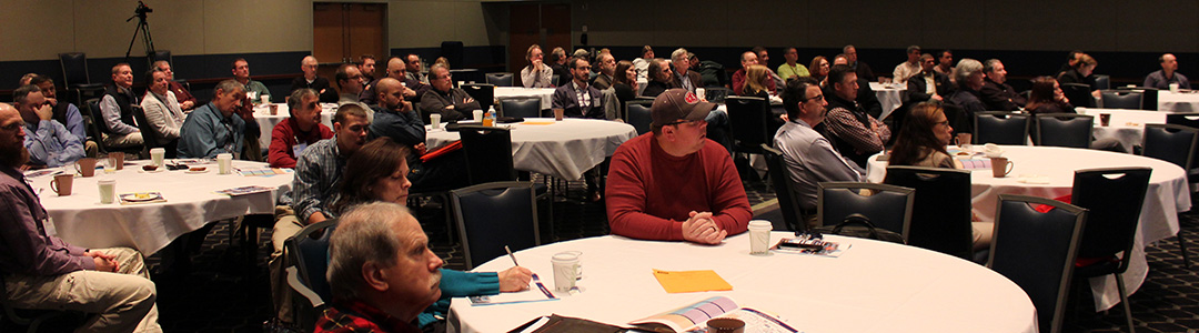 People attending conference session