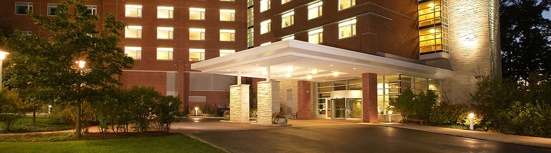 Exterior view of Penn Stater Hotel at night