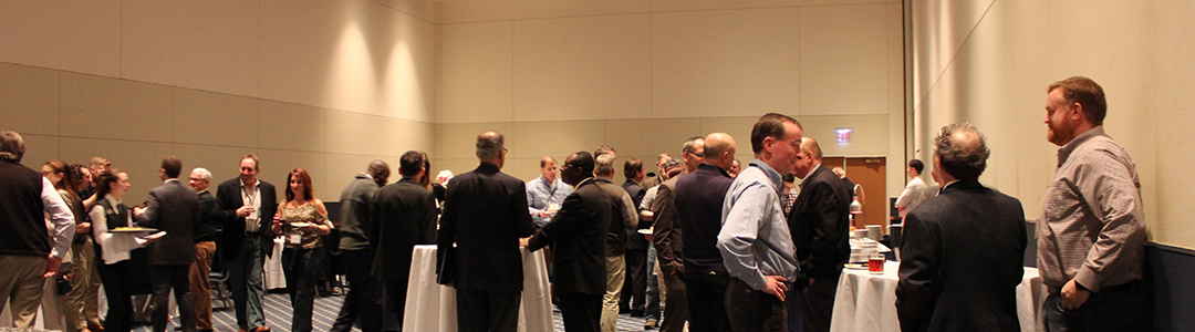 People networking at evening reception