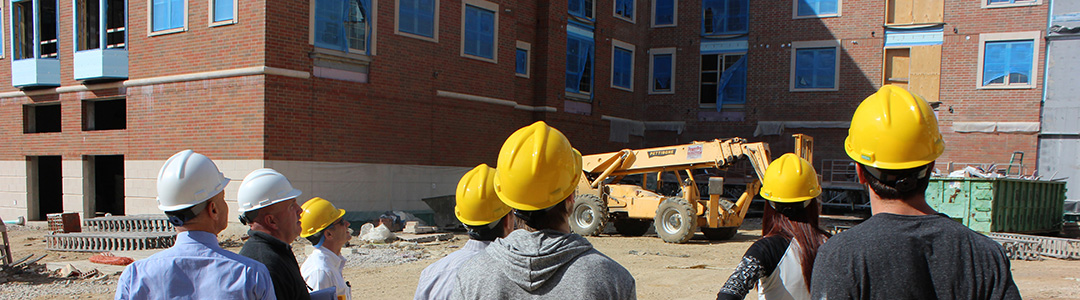 Students attending site visit of multifamily project