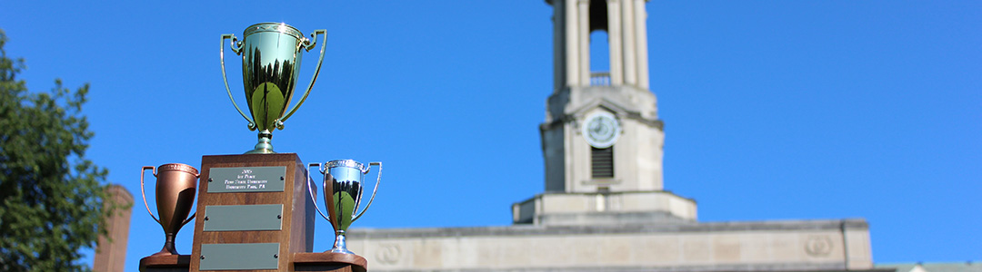 Trophy in front of Old Main