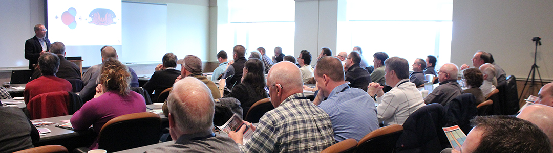 People attending conference session